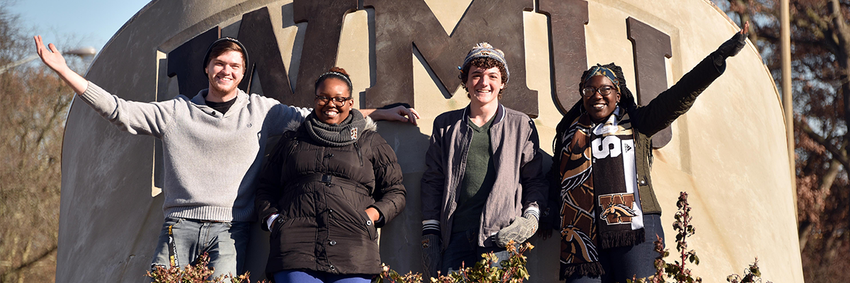 Group of Students in front of Western Seal statue