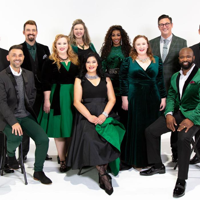 The Voctave singing group dressed in black and green