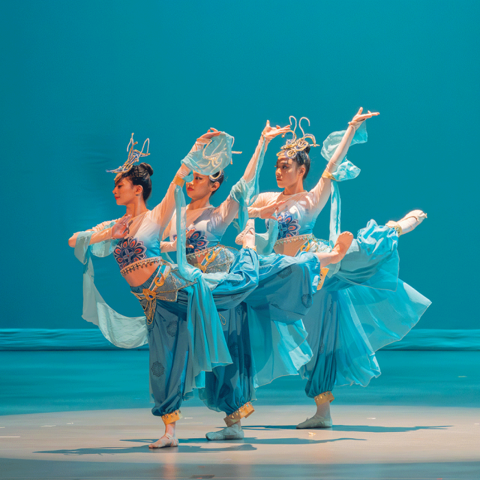 Three Dancers on a blue background