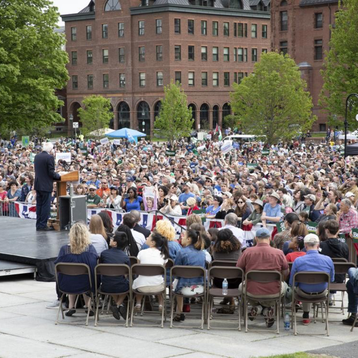 Bernie Sanders talking with a crowd