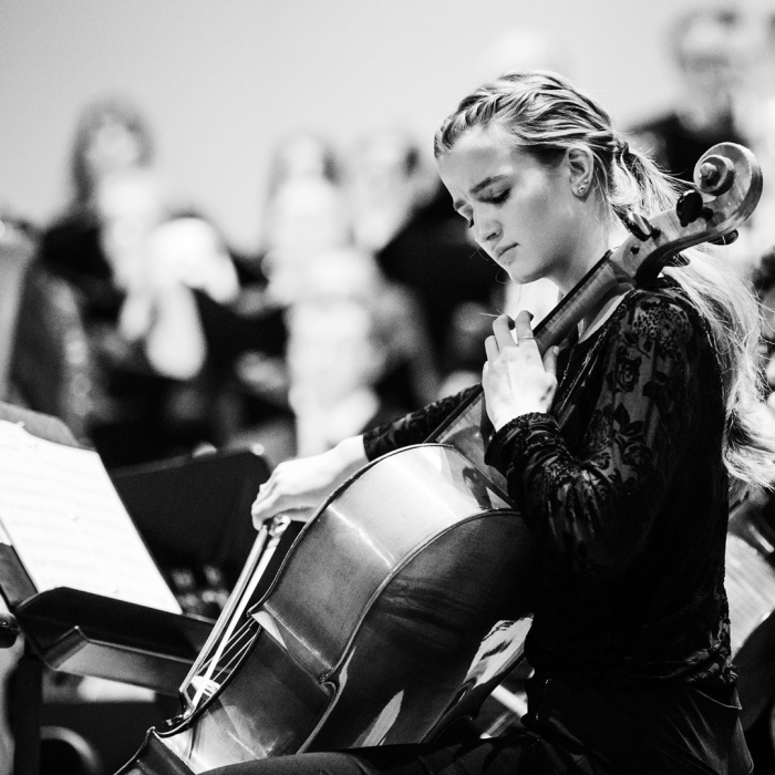 Cello player looking at music